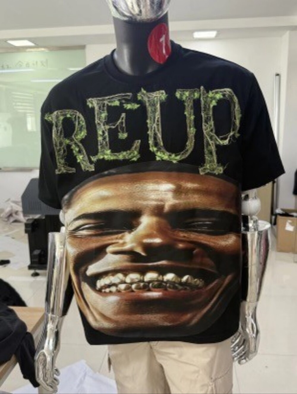 Black Graphic Tee with Large Face & REUP Lettering